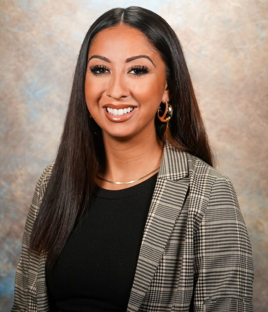 a woman smiling for a picture