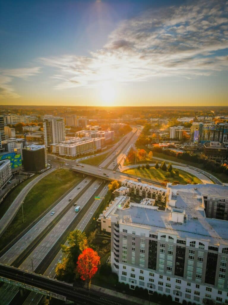 a city with a road and buildings