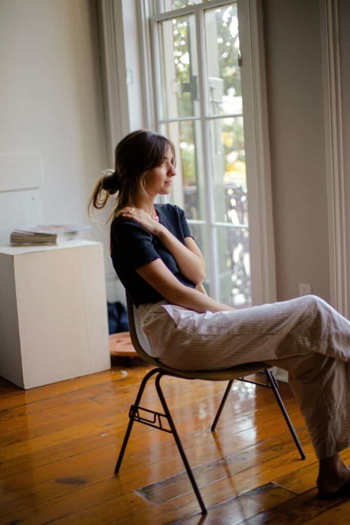 a woman sitting in a chair