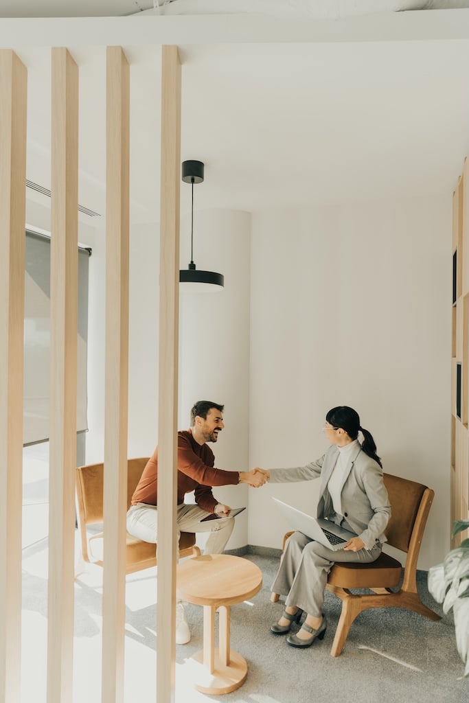 Therapist greeting her client in a luxury rehab near Durham, NC.